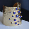 gold plated lapis lazuli eye catching statement bracelet